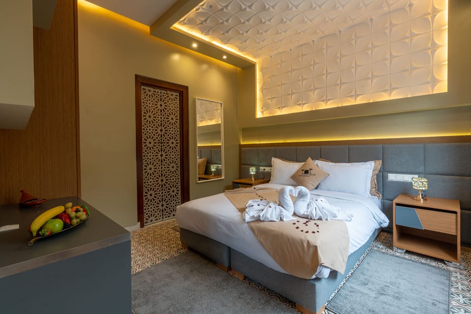Family Suite, Pool View | In-room safe, iron/ironing board, free WiFi