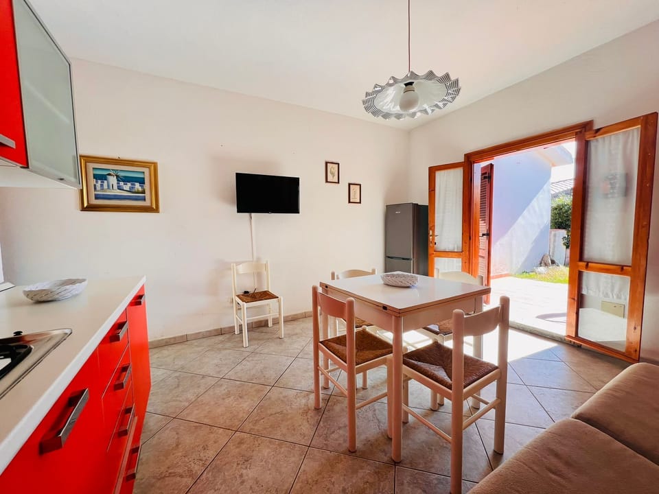 Apartment | Living area | 22-inch flat-screen TV with cable channels