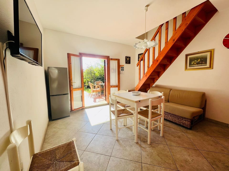 Apartment | Living area | 22-inch flat-screen TV with cable channels