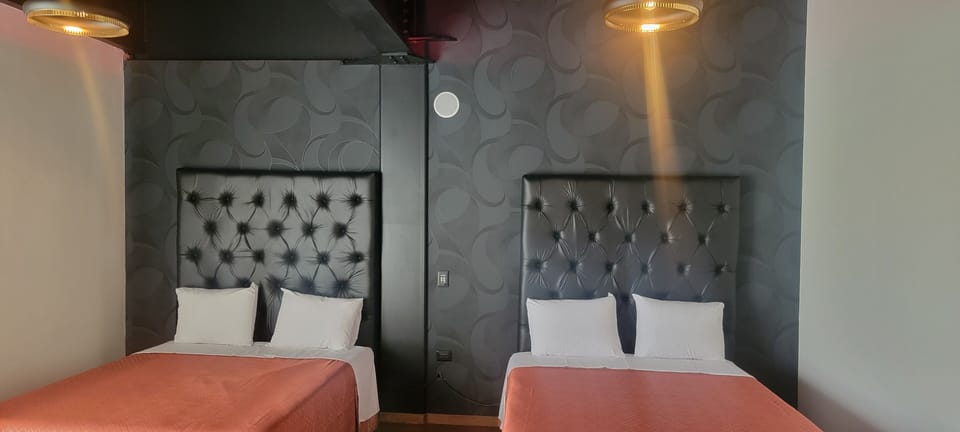 Business Quadruple Room, City View | Down comforters, Select Comfort beds, soundproofing, WiFi (free)