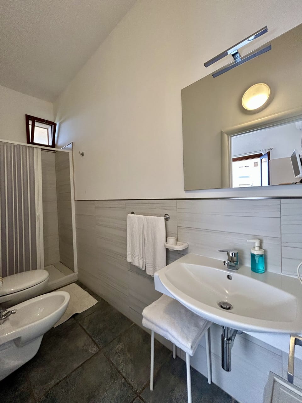 Economy Room, Sea View | Bathroom | Shower, rainfall showerhead, free toiletries, hair dryer