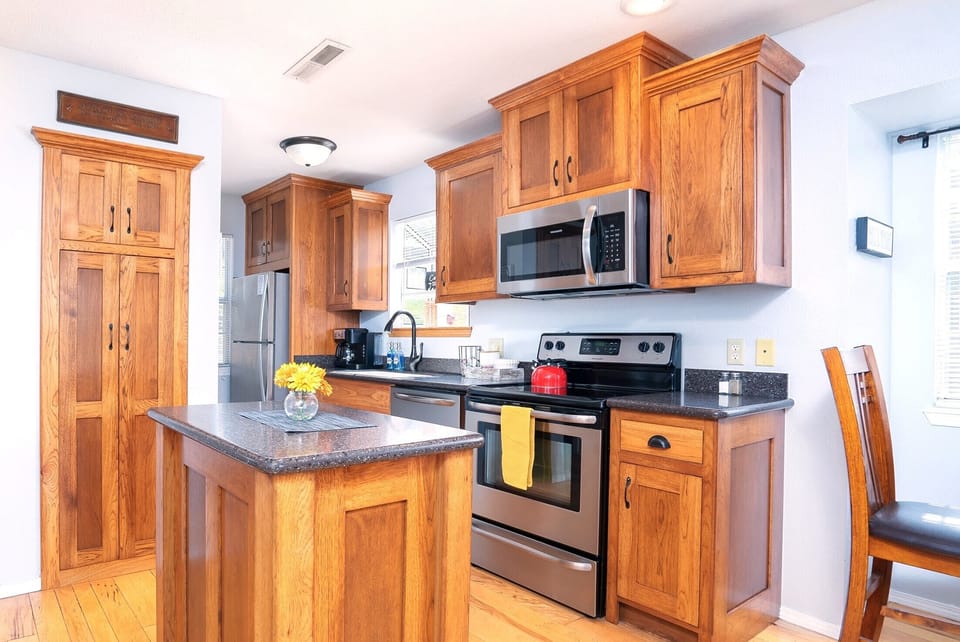 Whip up a delicious meal in the fully equipped kitchen - the heart of your cozy condo that's sure to inspire your inner chef!