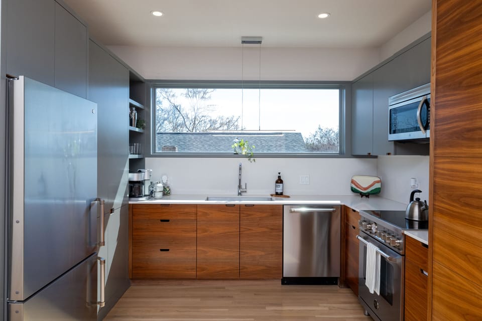 Fully stocked kitchen with stainless steel appliances
