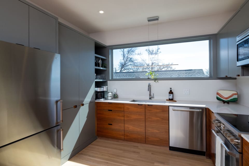 Fully stocked kitchen with stainless steel appliances