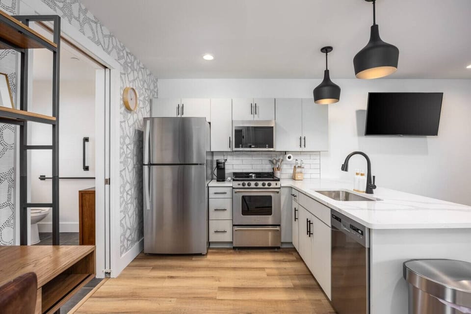 Recently updated kitchen with all the appliances and utensils you might need to enjoy a meal at home. Toaster, Keurig machine, K-cups, and more all provided for your ease & convenience.
