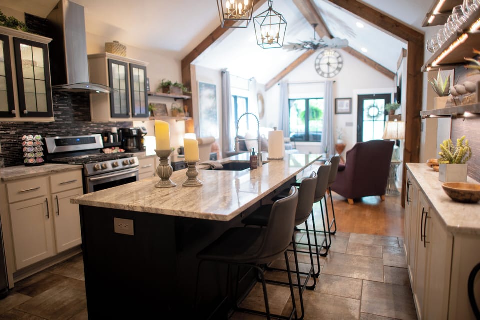 Kitchen with island seating and gas stove