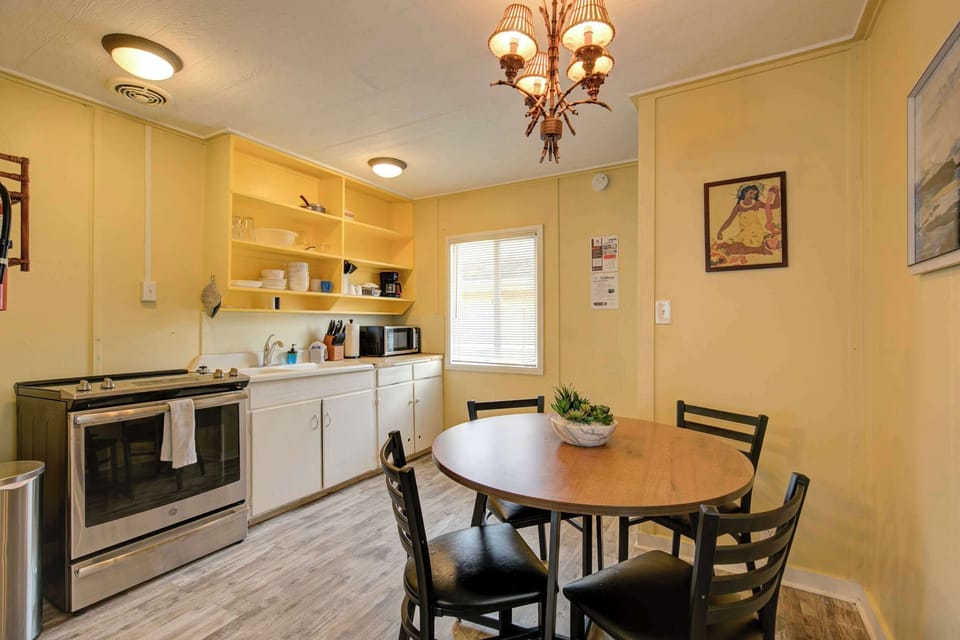Enjoy meals and conversation around this cozy round table