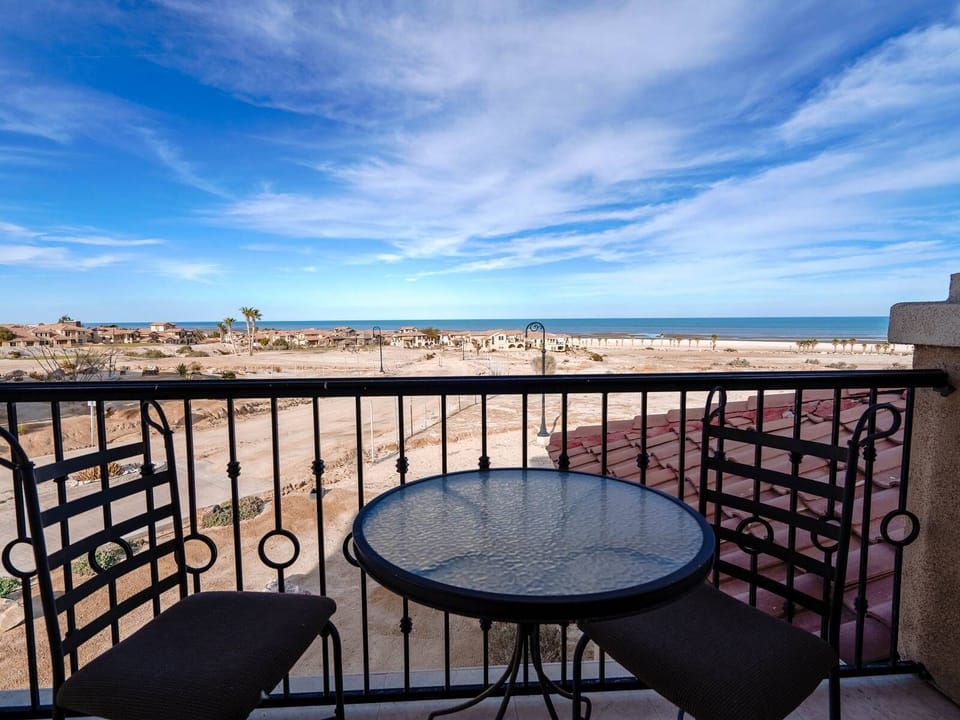 Private balcony overlooking the 18-hole golf course and Sea of Cortez — perfect for sunrises and sunsets .