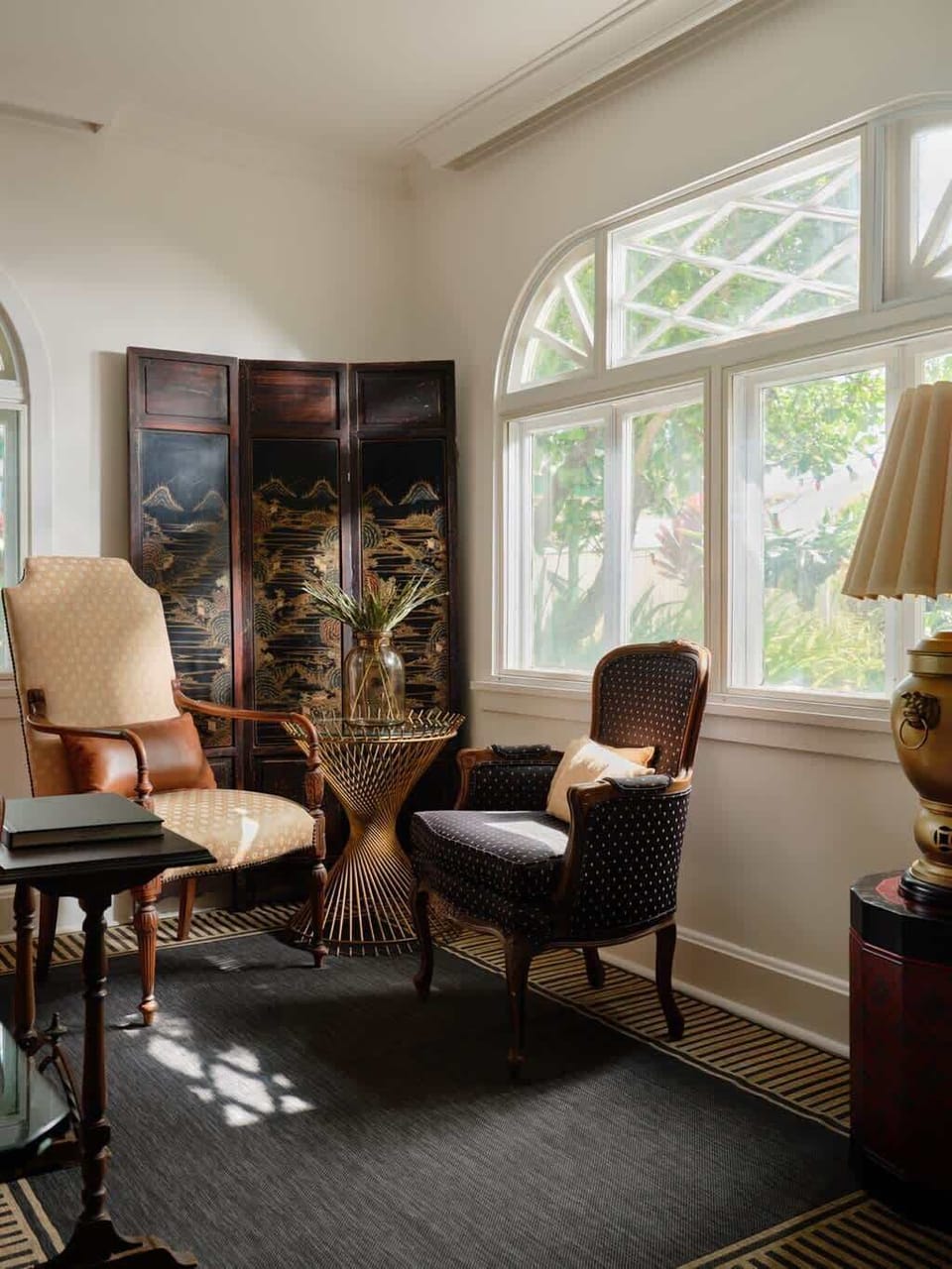 Relax & unwind in style.  This inviting space is perfect for quiet moments or lively chats.