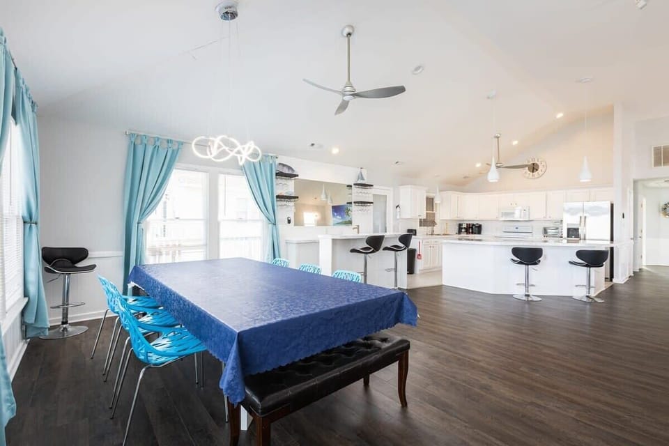 Top Level: Dining area with table seating for ten (10).