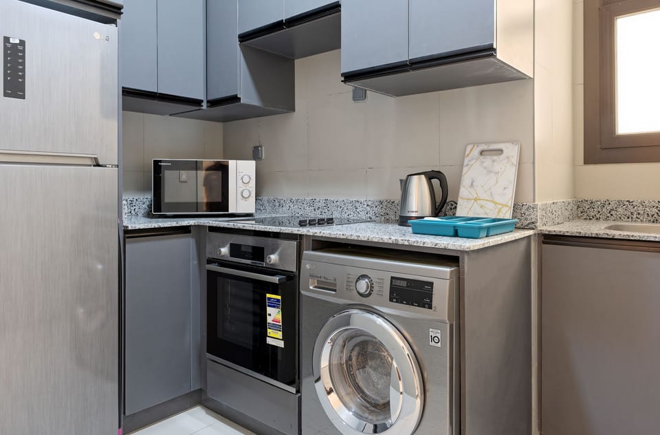 Fridge, microwave, cookware/dishes/utensils, paper towels