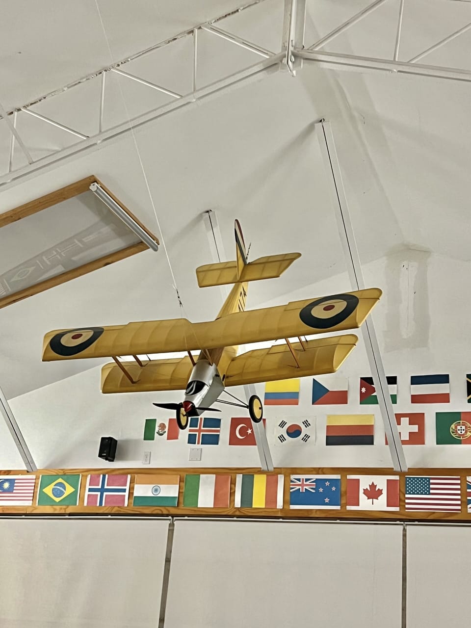 To remind you that you are in an airplane hangar! :) 