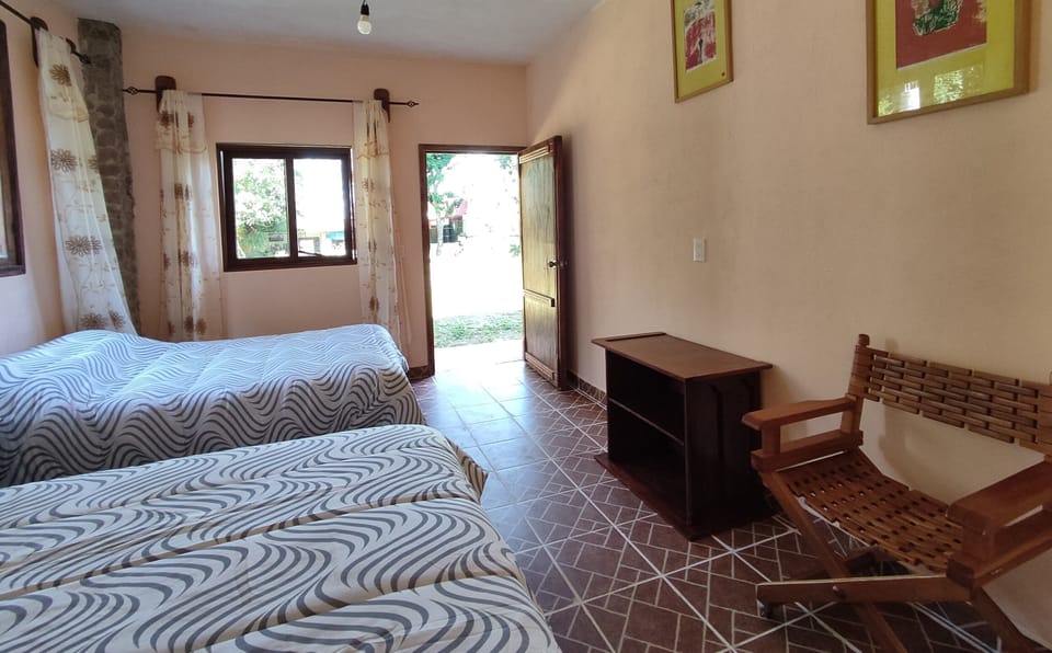 Economy Room, Multiple Beds, Ensuite | 1 bedroom, in-room safe, individually decorated, individually furnished