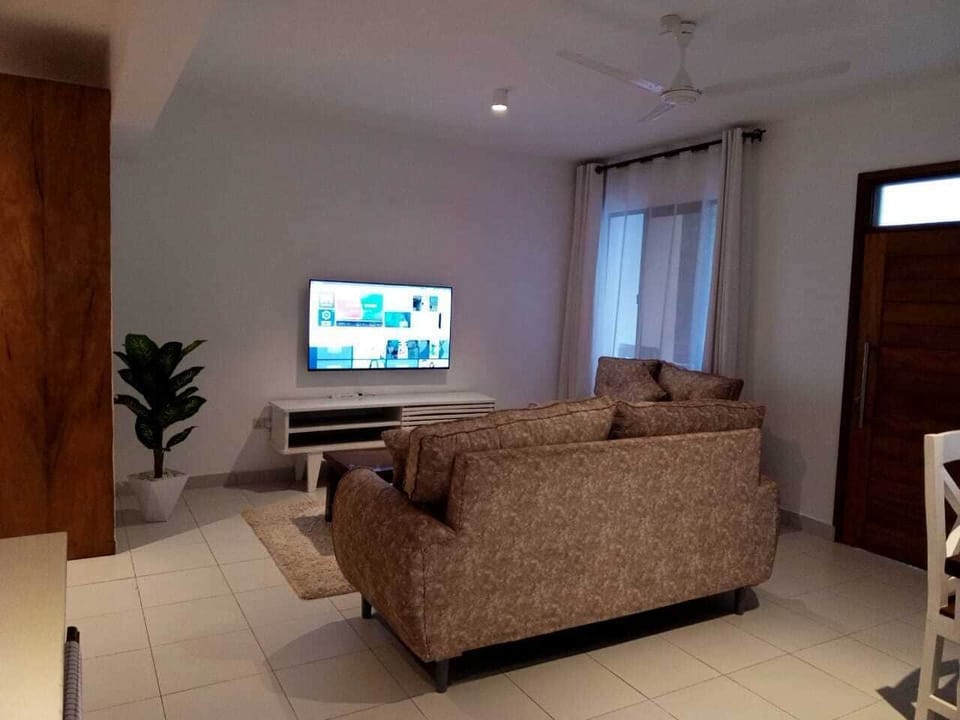 Superior Apartment | Living area | 24-inch Smart TV with digital channels