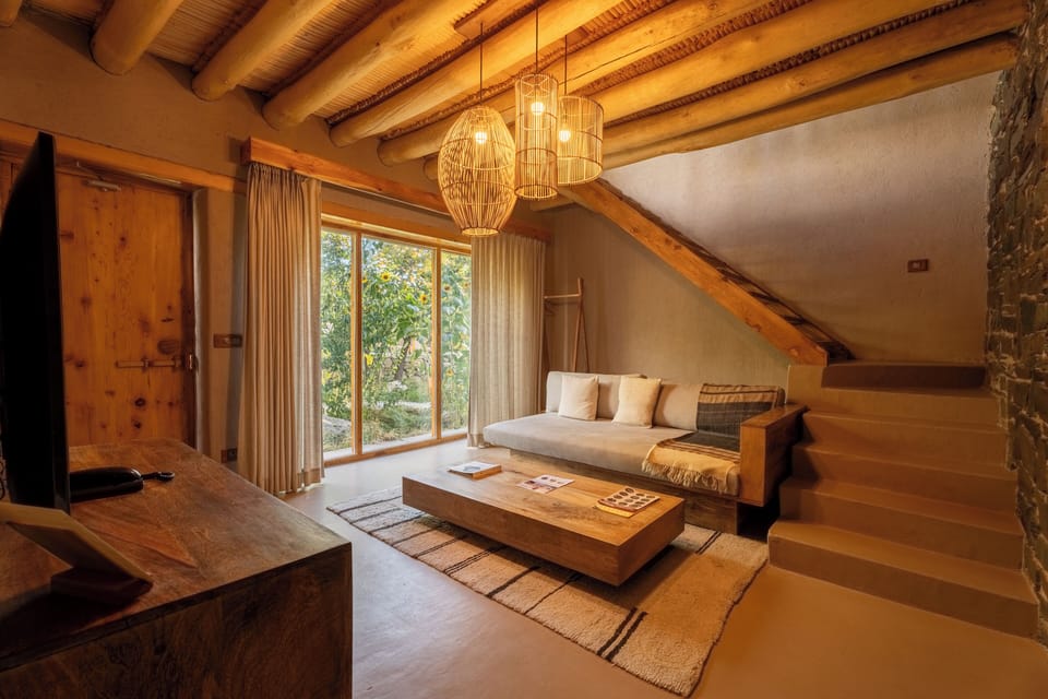 Luxury Villa | Living area | 50-inch LED TV with digital channels, fireplace, Netflix