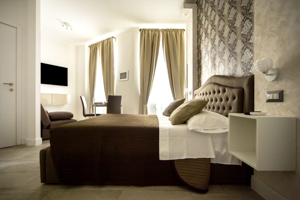 Premium bedding, down comforters, memory foam beds, in-room safe