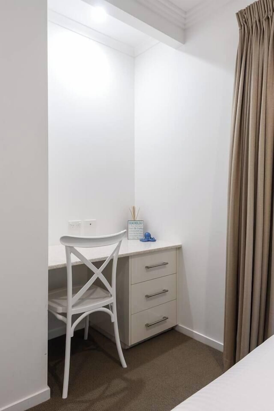 The second bedroom features a desk where guests can work remotely.