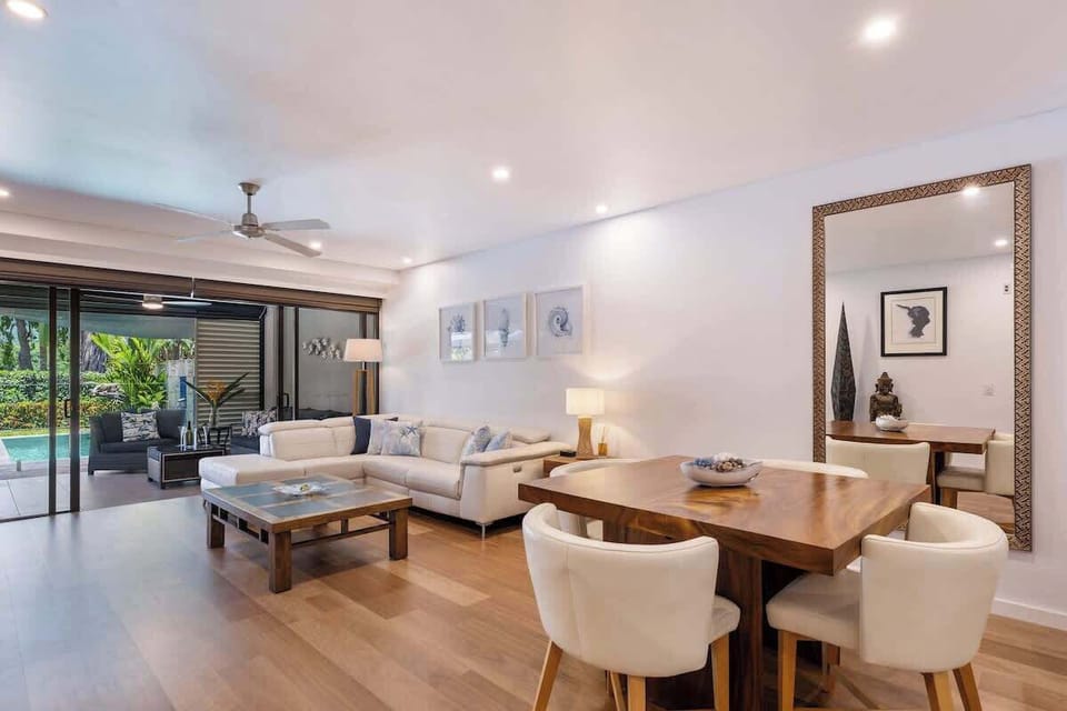 Savour delicious meals in the stylish dining area, complete with chic chairs designed for both comfort and aesthetic appeal.