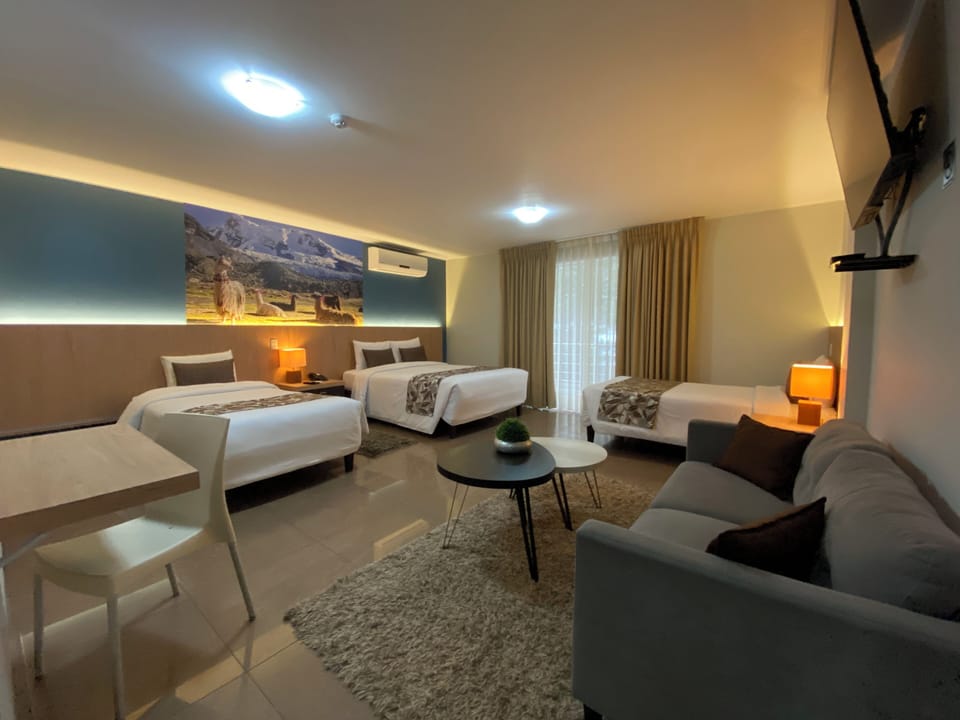 Family Room | Down comforters, in-room safe, desk, laptop workspace