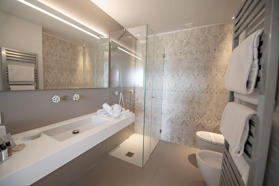 Junior Suite, Garden View (Catria) | Down comforters, pillowtop beds, in-room safe, individually decorated