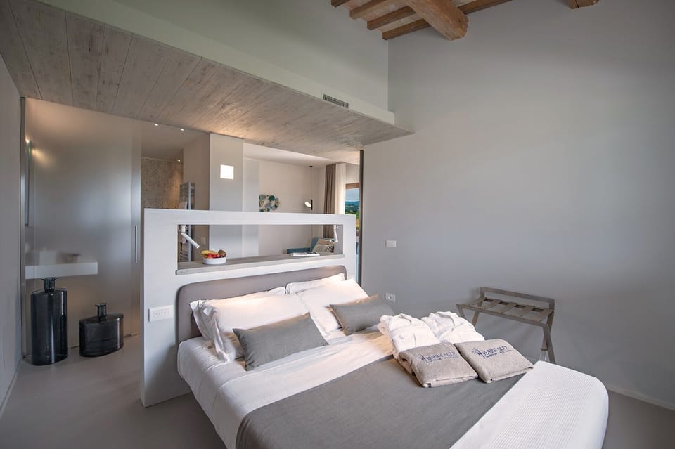 Junior Suite, Garden View (Catria) | Down comforters, pillowtop beds, in-room safe, individually decorated