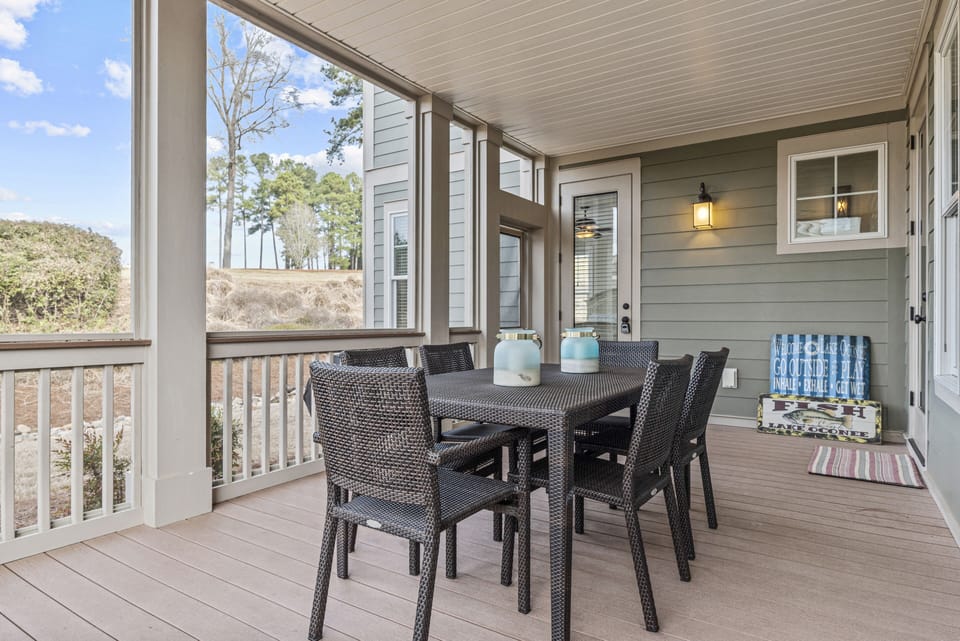 Main Floor - Screened in Porch with Dining Area