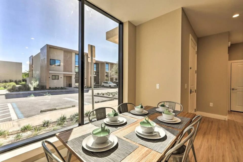 Dine with a view in a bright and inviting space that overlooks the beautiful outdoors, making every meal feel special.