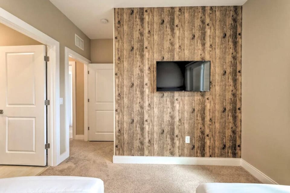 Bedroom equipped with a TV for your ultimate relaxation and entertainment.