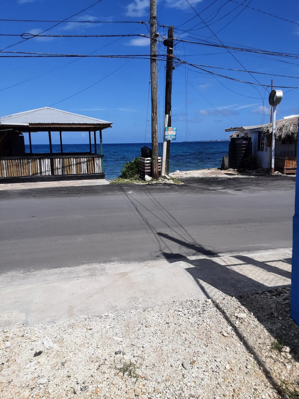 Street and Sea view from the front bedroom.