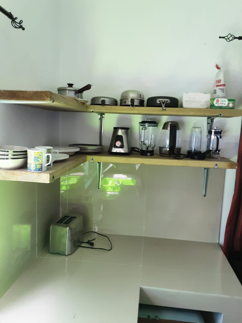 French Press, Blender, Toaster, Microwave, Pots, Pans, Plates and utensils.