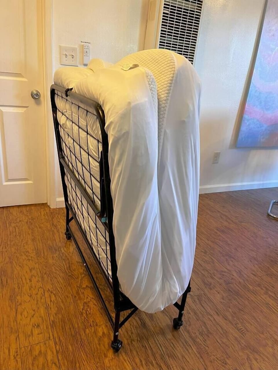 The rollaway beds can be folded up and stored in the laundry room.