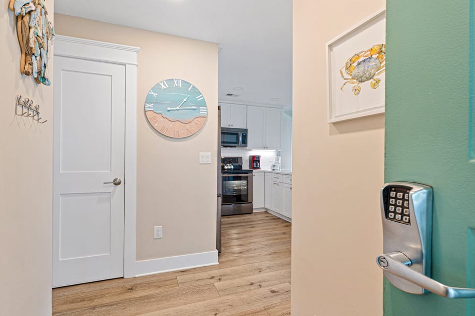 The welcoming entry foyer sets the tone for a relaxing coastal getaway.