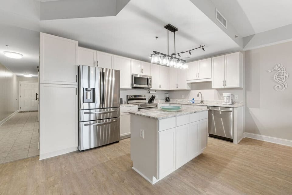 Fully Stocked Kitchen with Drip Coffee Maker, Stainless Steel Appliances, Basic Cookware and Lake Views