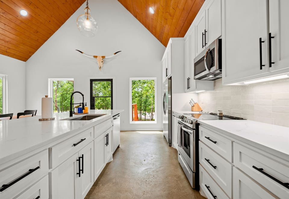 Our expansive kitchen is the heart of the home, designed for both cooking and socializing.
