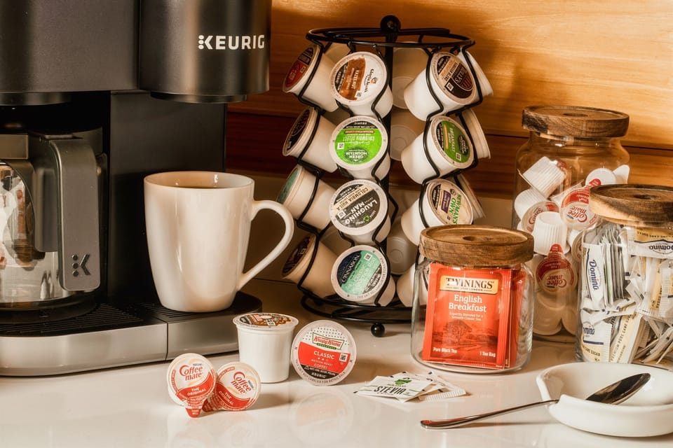 Start your day here with coffee including K-cups, ground coffee, tea, creamer and sugar.