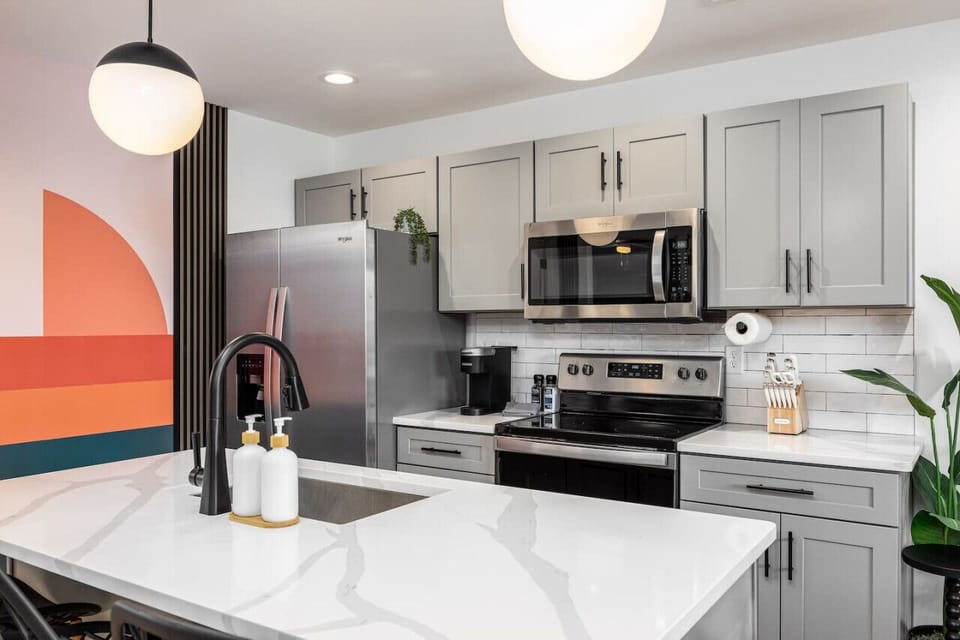 New high-end appliances in the kitchen with all the utensils you'd need to enjoy a meal at home.