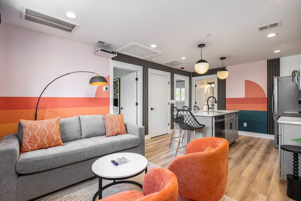 Colorful, comfortable furnishings throughout this updated condo. Relax in the living room with a Smart TV, room-darkening shades, and a pull-out couch.