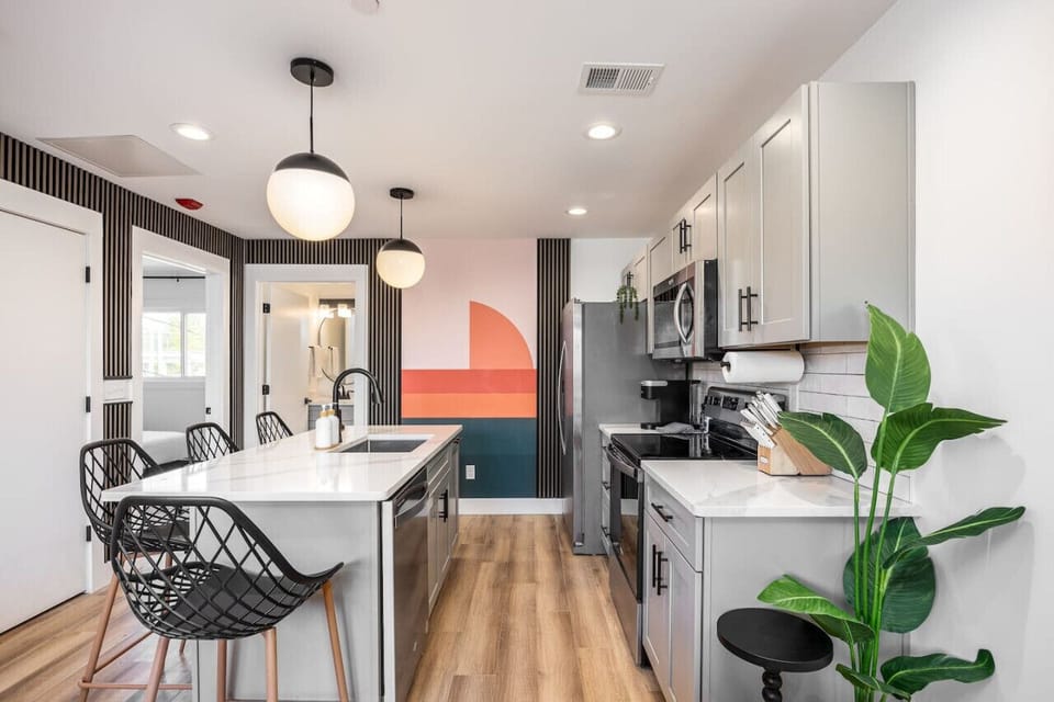 Lots of natural light and color in this recently updated condo. High-end kitchen appliances and all the utensils you might need to make a meal.