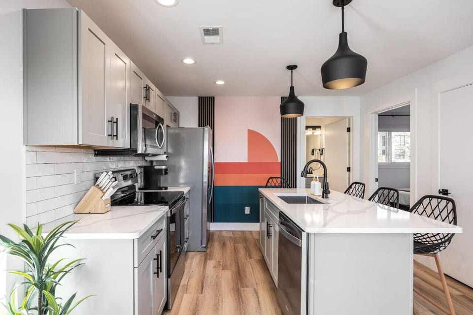Updated kitchen with all the appliances & utensils you need to make and enjoy a meal at home. Seating for 4 at the counter.