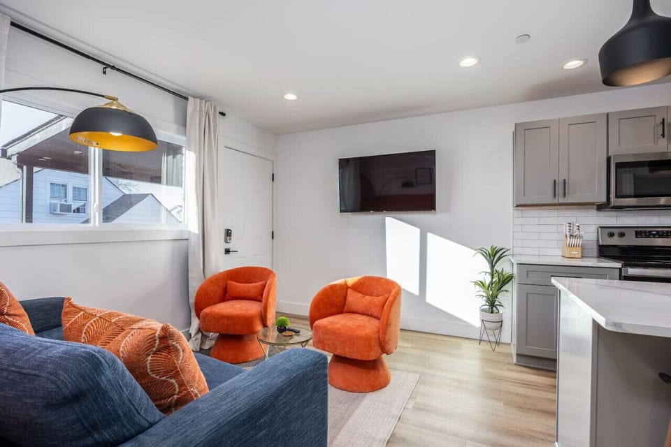 Unwind in the living room by enjoying the Smart TV with all the streaming apps, comfortable pull-out couch, and room-darkening shades.
