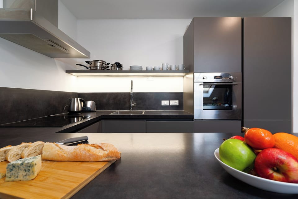 Luxury Apartment | Private kitchen | Full-size fridge, microwave, oven, stovetop