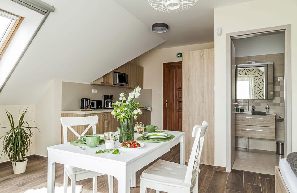 Panoramic Studio, Lake View | Living area | 81-cm Smart TV with digital channels