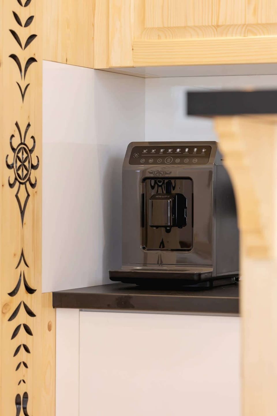The kitchenette is equipped with modern appliances.