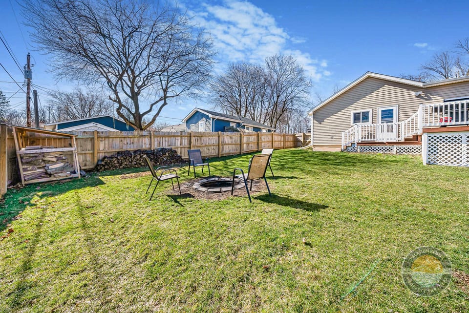 This spacious backyard gives your group plenty of room to spread out and enjoy the outdoors. Perfect for relaxing in the sunshine, playing games, or gathering around the firepit at night while enjoying the quiet Lake Geneva neighborhood setting.