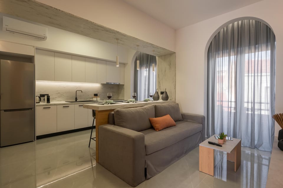 Premium Apartment | Living area | 43-inch Smart TV with cable channels