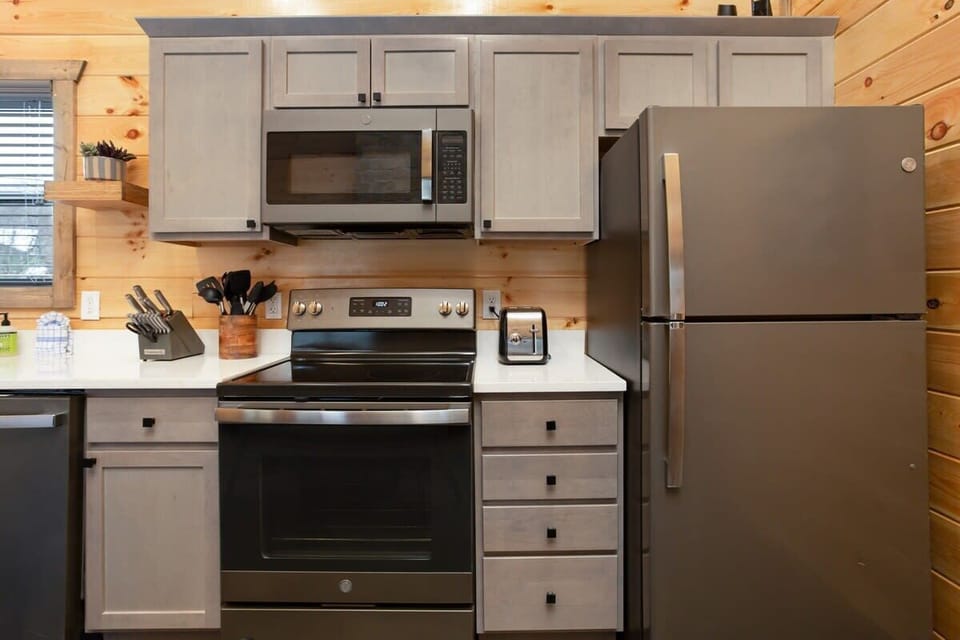 Custom Wood Cabinets With Stainless Steel Appliances And Quartz Countertops!
