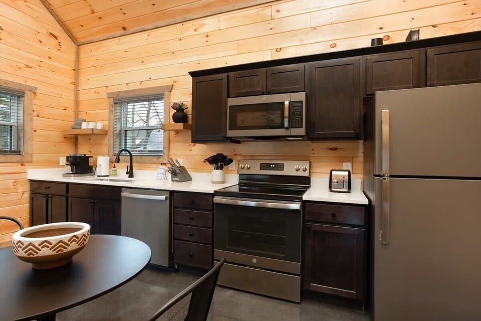 Custom Wood Cabinets, Quartz Countertops, And Stainless Steel Appliances!