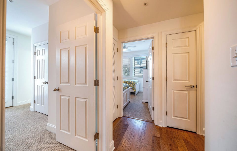 Spacious hallway with easy bedroom and bathroom access