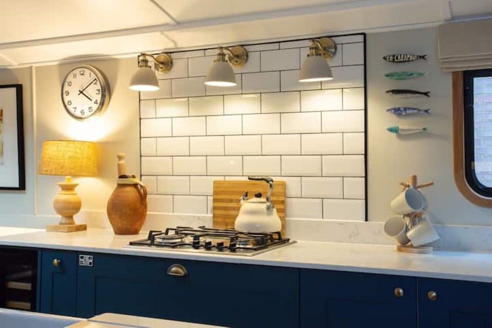 Kitchen appliances: dishwasher, washing machine, fridge/freezer, wine fridge
