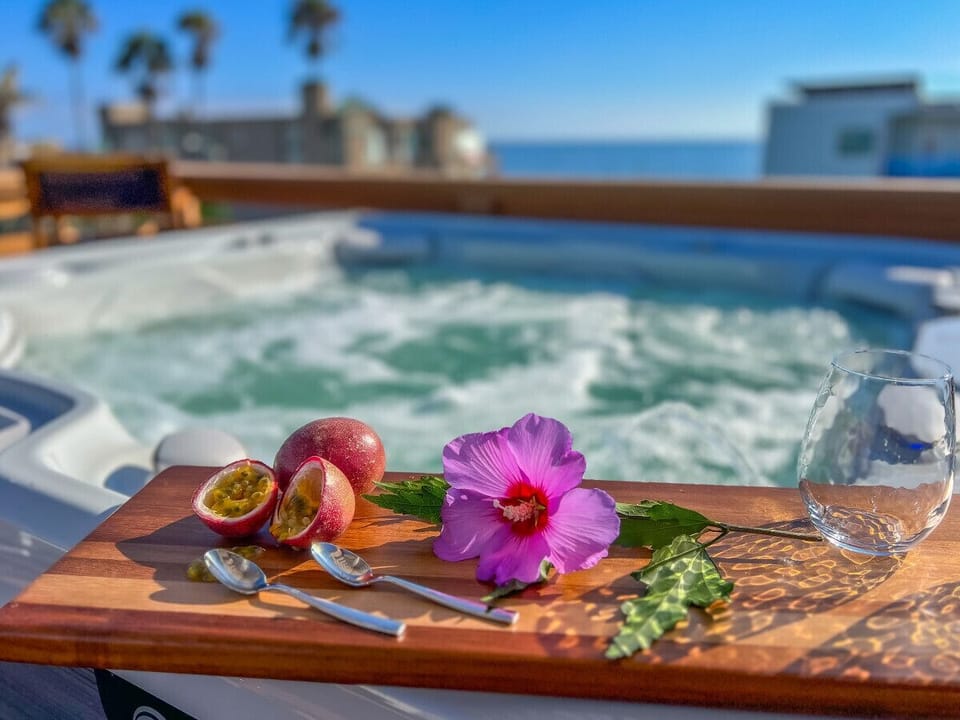 Utilize the charcuterie board to offer a delectable assortment of snacks on the sun deck